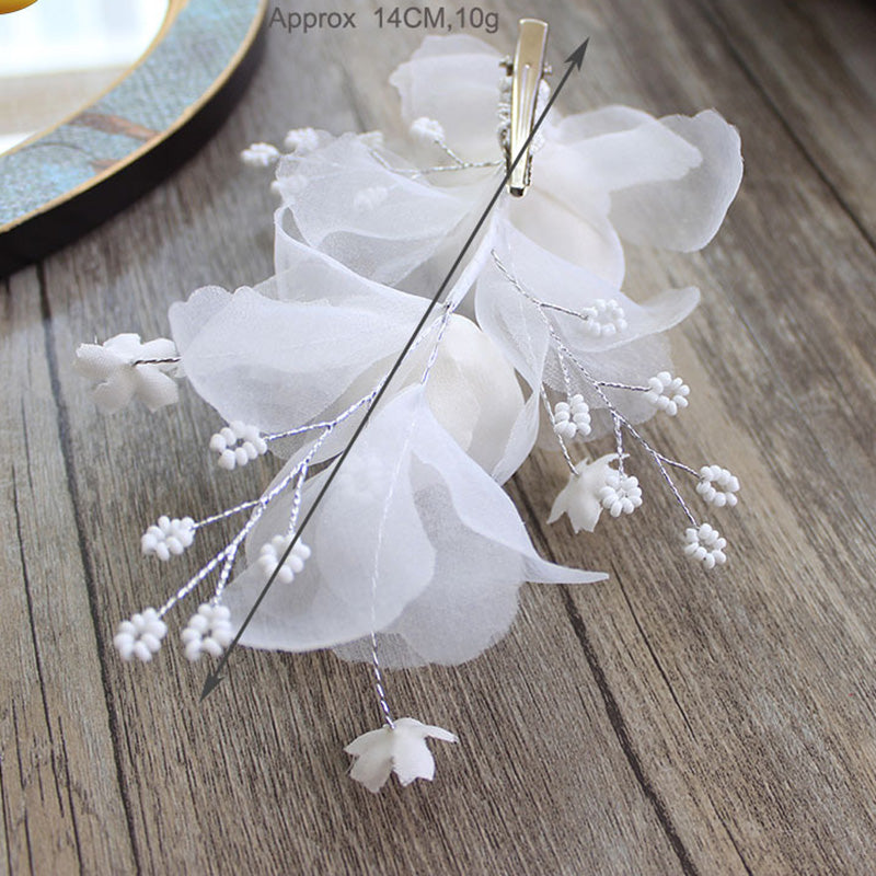 Wedding White big voile flower hair pin Description: hair pin  material: voile,pearl,glass beads  color:white  size:18*10cm