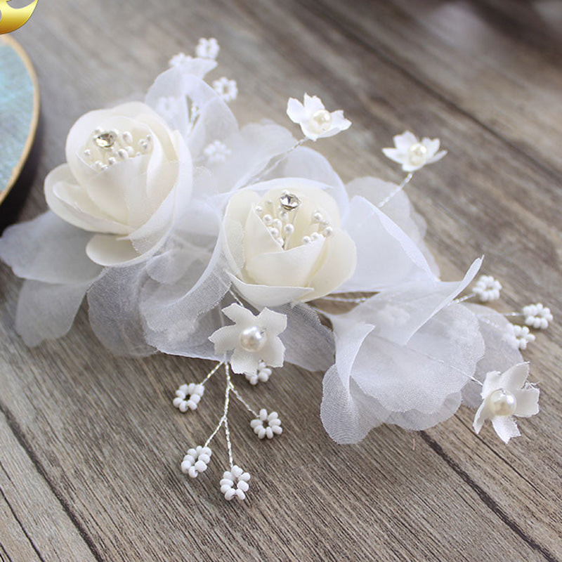 Wedding White big voile flower hair pin Description: hair pin  material: voile,pearl,glass beads  color:white  size:18*10cm